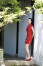 Chinese cheongsam model in Chinese classical garden